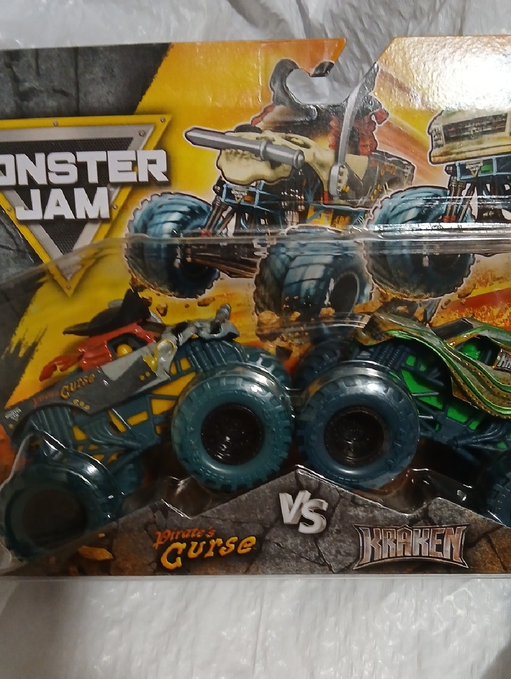 Pirate's Curse vs Kraken Monster Jam  Truck 2-Pack - Teal and Green.